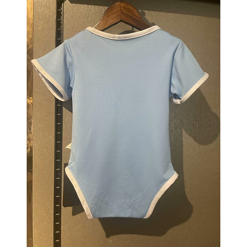 Camiseta Manchester City 2023/2024 Home Baby